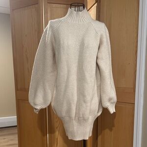 Cream colored oversized sweater ..perfect over leggings.  New with tags